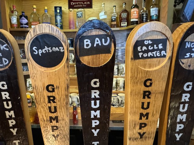 A row of tap handles at the Grumpy Troll.