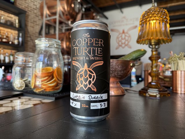 A can of Copper Turtle beer on its bar in Milwaukee.