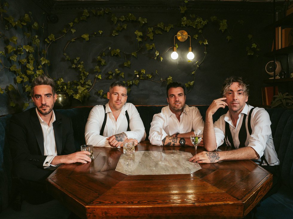 The four members of All Time Low.