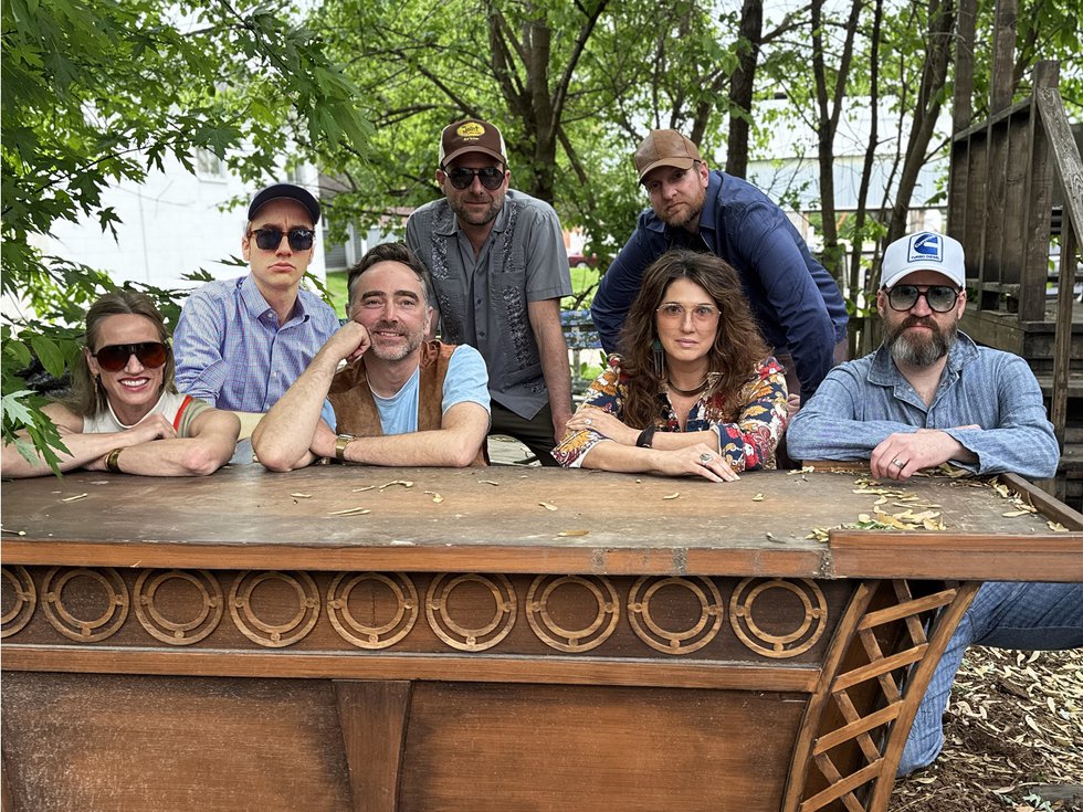 The seven members of Cribshitter pause for a photo.