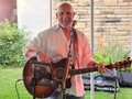 Ron Denson and guitar.