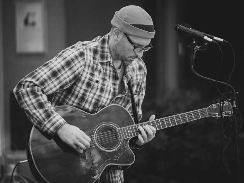Noah James Hittner and guitar.