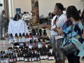 Shoppers and a display at a past Hub Marketplace.