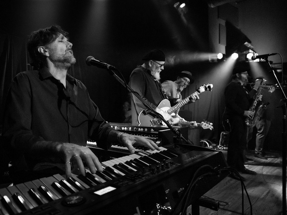 The Jimmys on stage.