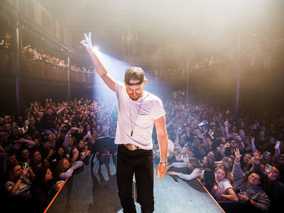Chase Rice on stage.