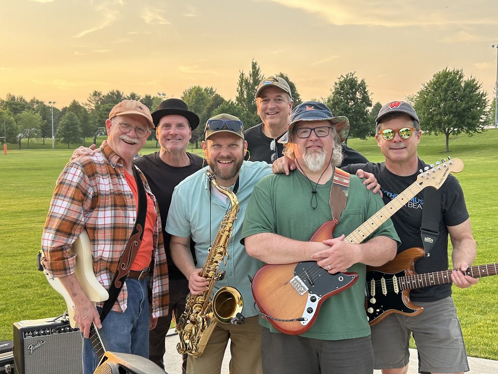 The Trophy Husbands and instruments.