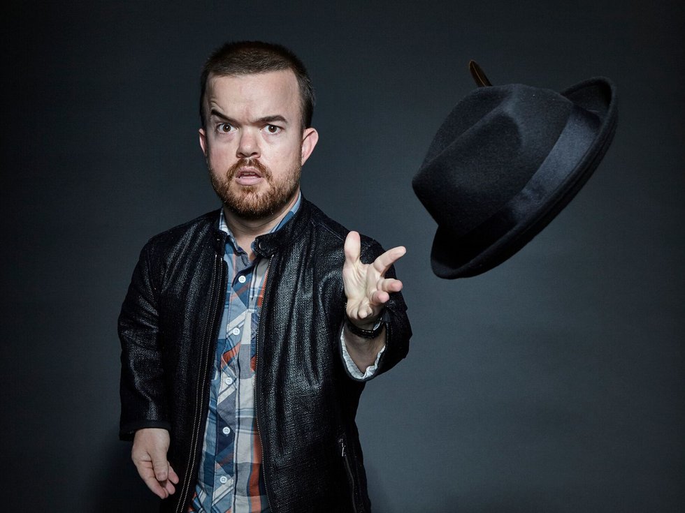 Brad Williams tossing a hat.