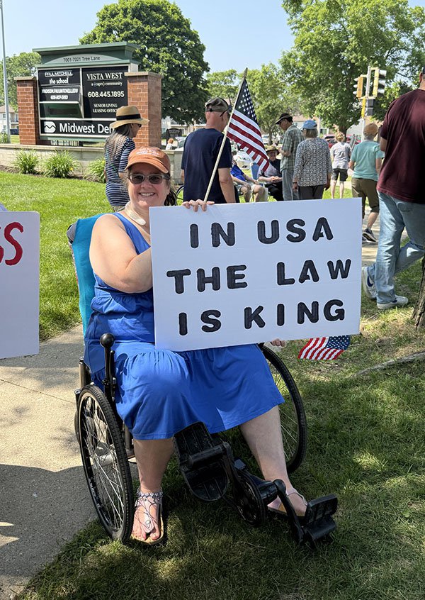 Hanover, Pennsylvania resident Carrie Paulen in Madison June 14 for a 'No Kings' rally on Mineral Point Road