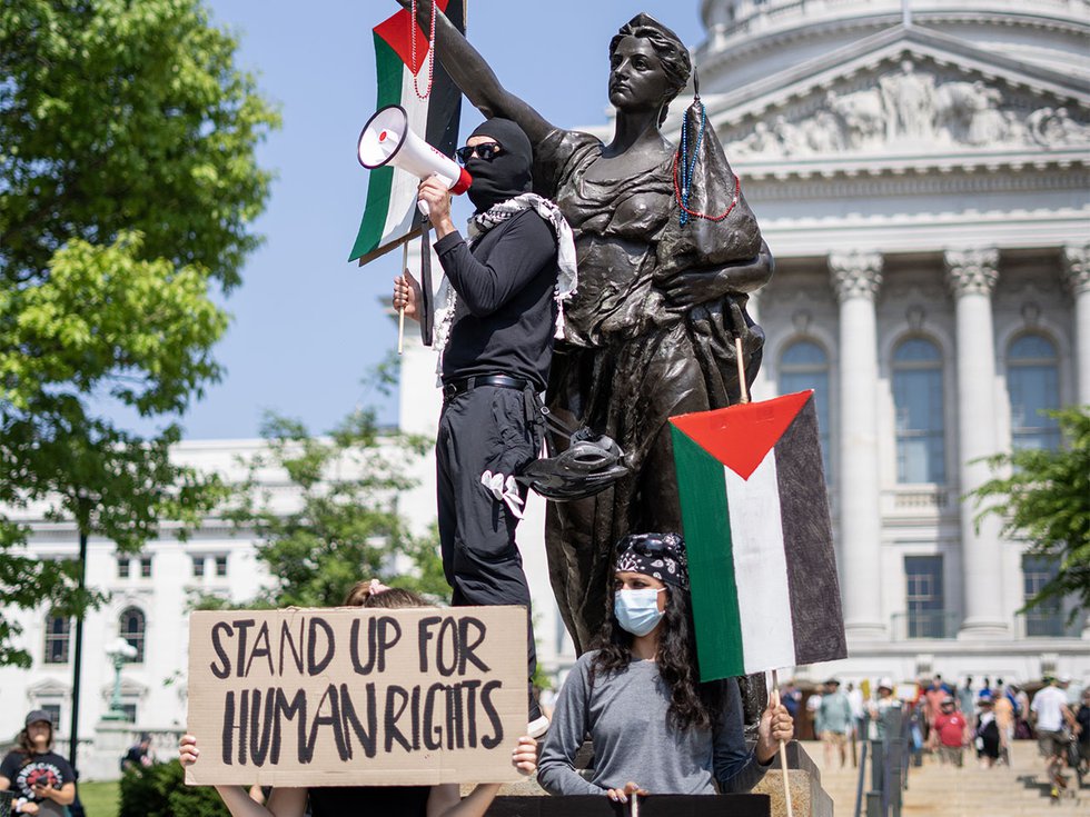 Pro-Palestine protesters at the No Kings protest on June 14, 2025.