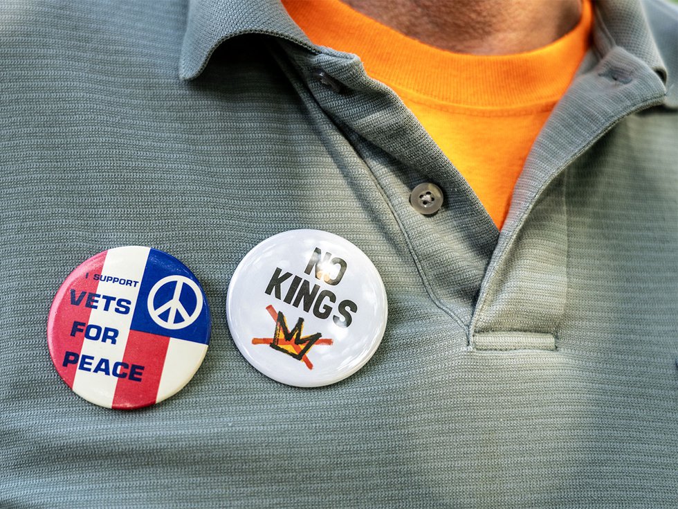 A protestor wearing an "I Support Vets for Peace" pin at the No Kings protest on June 14, 2025.
