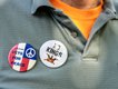 A protestor wearing an "I Support Vets for Peace" pin at the No Kings protest on June 14, 2025.