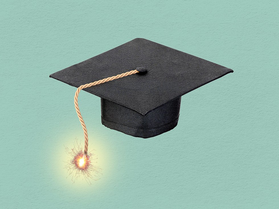 A graduation cap with a tassle made of a lit fuse.